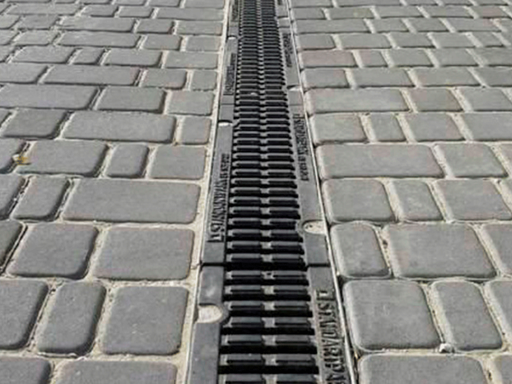 Rigola carosabila din fibrobeton seria PRO DN100 H210 cu gratare din fontă ductilă, clasa D400 (1000x160x210) cu racord vertical D110mm