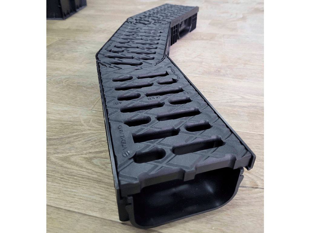 Лоток водоотводной Easy-2 DN100 H70 поворотный (центральный) (250x130x70) с решеткой пластиковой А15 черного цвета