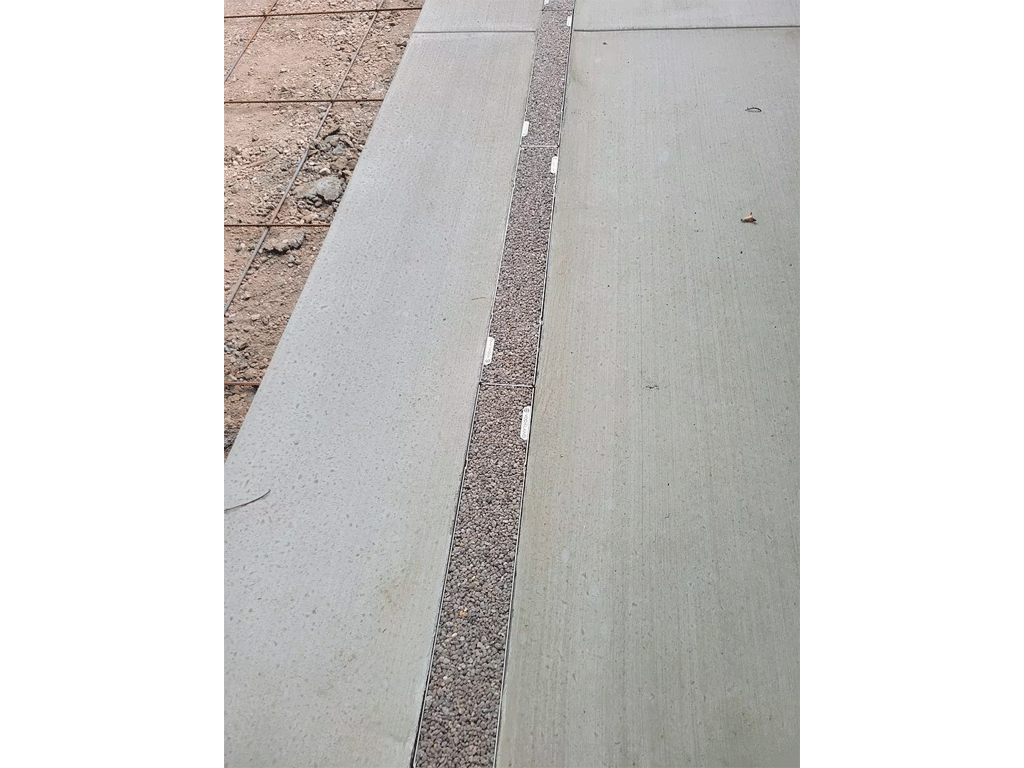 Rigolă pluvială Base DN100 H135 cu grătar din polimerbeton (Dark) cu cadru din INOX, clasa de sarcini A15 (1000x156x135)